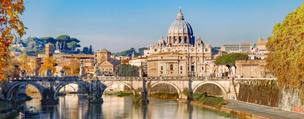 Una vista pintoresca de la basílica de San Pedro y el río, que muestra la belleza de la arquitectura icónica de Roma | MSC Cruceros